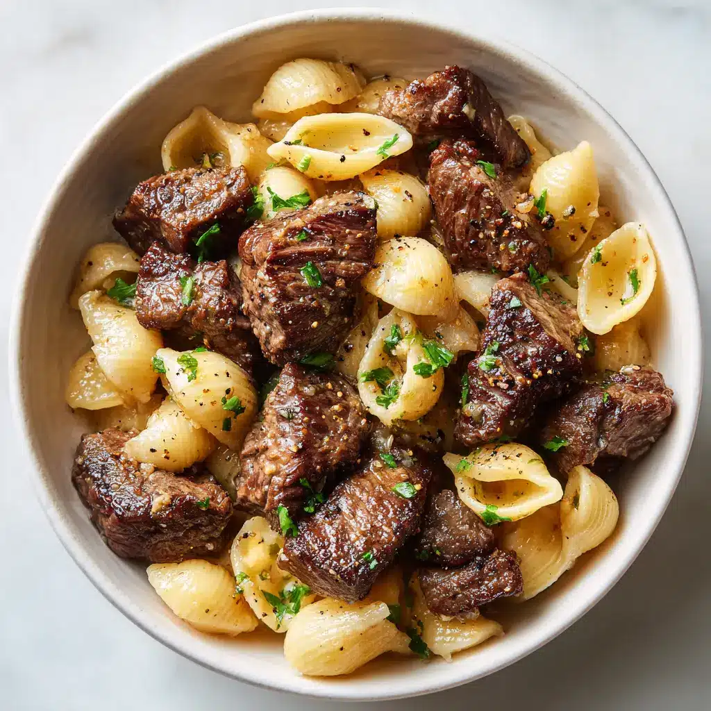 A plated serving of tender steak bites, garnished with parsley, ready to be eaten. A fork is lifting one of the juicy bites.