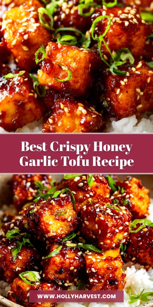 A plate of perfectly crispy honey garlic tofu, garnished with sesame seeds and green onions, ready to be served. A simple and delicious vegetarian meal.