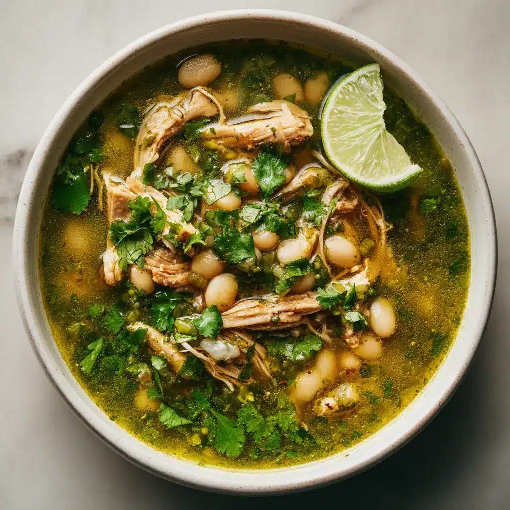 A beautiful serving of crockpot chicken posole verde, showcasing an array of fresh toppings like avocado, radishes, and cilantro.