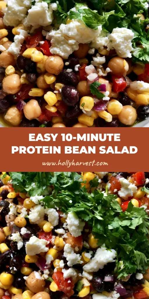 Chickpea and Black Bean Salad with Zesty Lime Oil Dressing 4 A close-up vertical shot of a vibrant Chickpea and Black Bean Salad with glossy lime oil and feta crumbles.